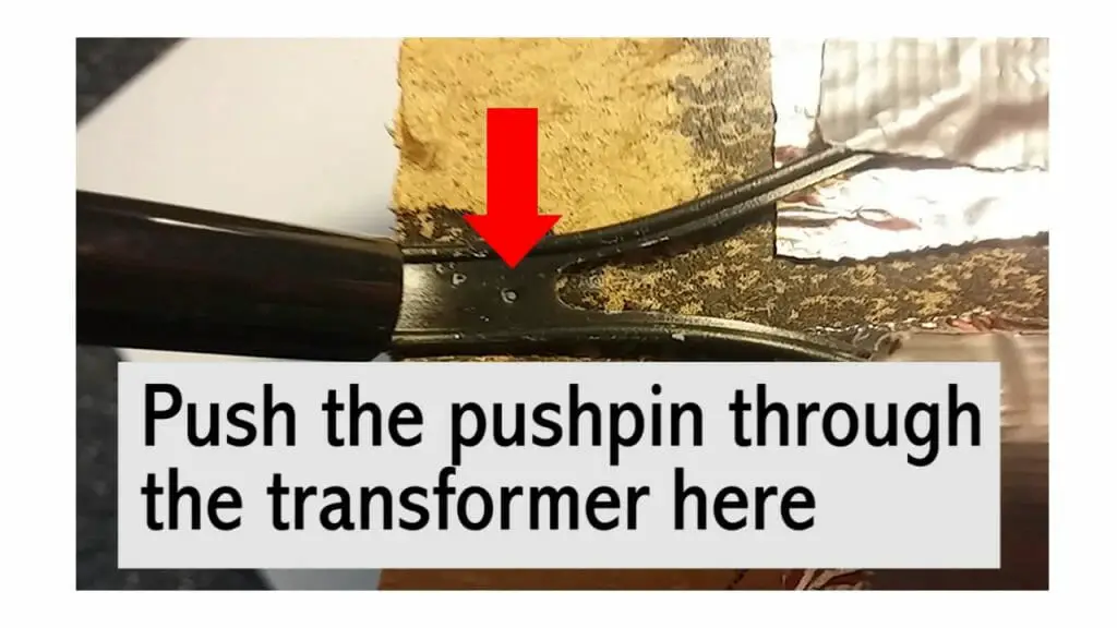 pushing the pushpin through transformer