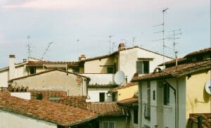 houses with brick roofs and antennas