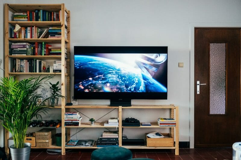 TV atop on the bookshelves